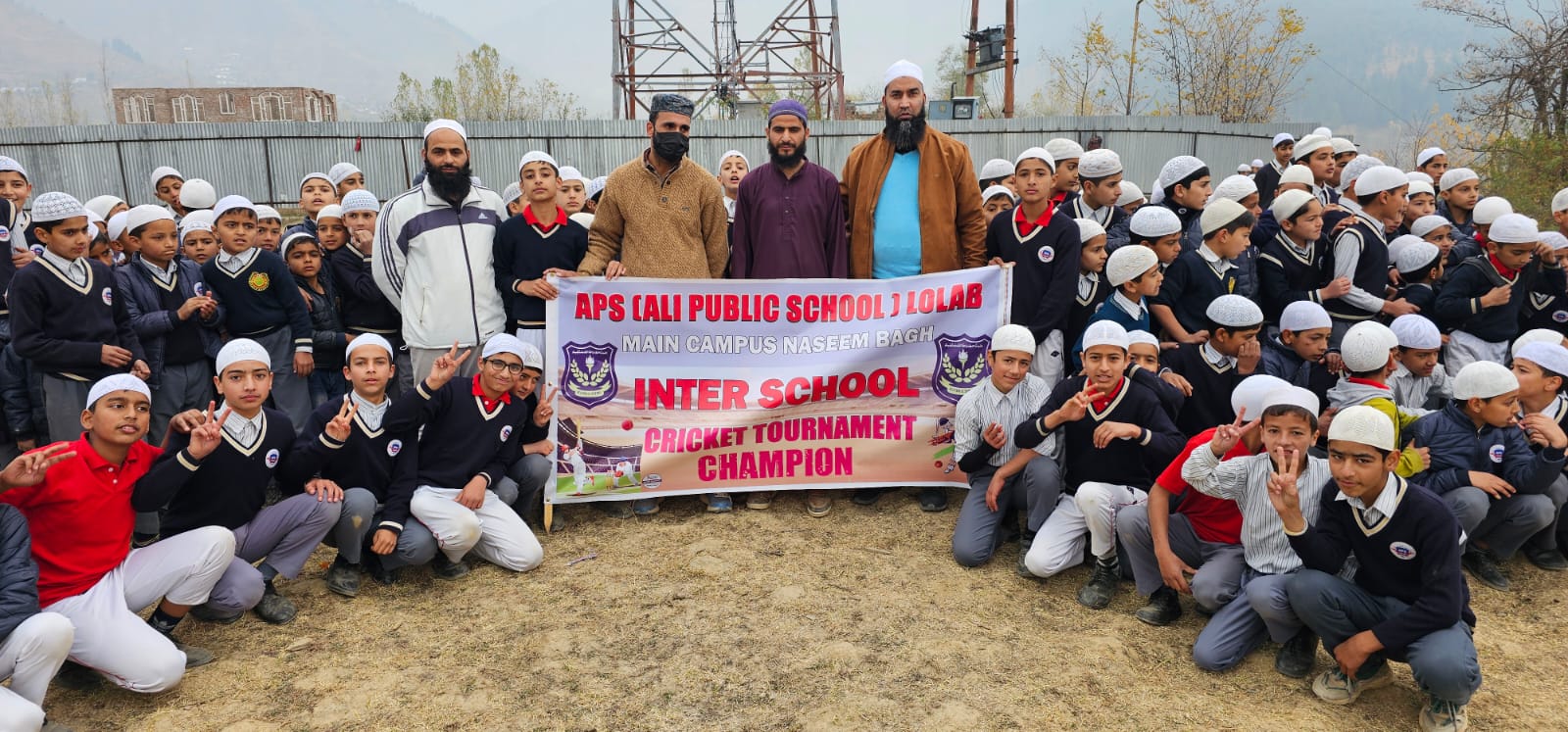 APS Lolab pupils and staff celebrating the Inter-School Cricket Tournament championship.